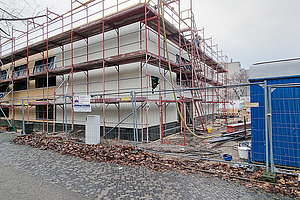 Neubau der Ev. Kita Regenbogenland: Dämmung Fassade und erste Putzschicht, 28.1.2025 (© Andreas Kaul)