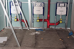 Neubau der Ev. Kita Regenbogenland: Verlegung Medien, 20.3.2025 (© Andreas Kaul)